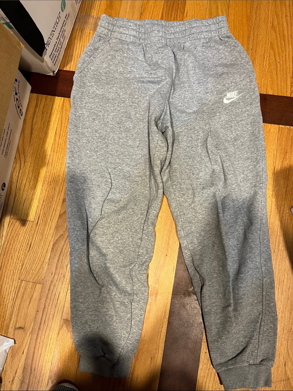 Nike Gray Kids Fleece Joggers with White Swoosh